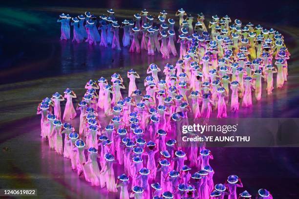 Performers take part in the opening ceremony of the 31st Southeast Asian Games at the My Dinh National Stadium in Hanoi on May 12, 2022.