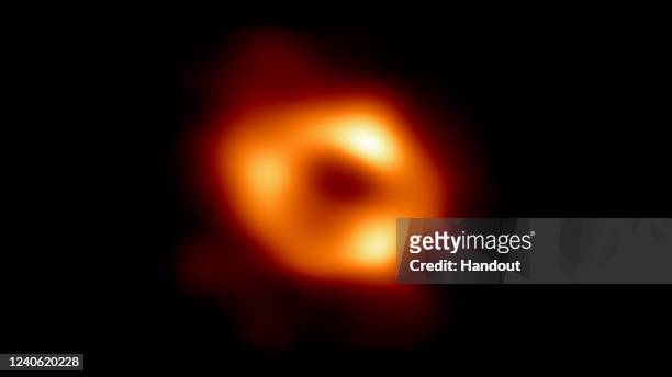 In this handout photo provided by NASA, This is the first image of Sgr A*, the supermassive black hole at the centre of our galaxy, with an added...