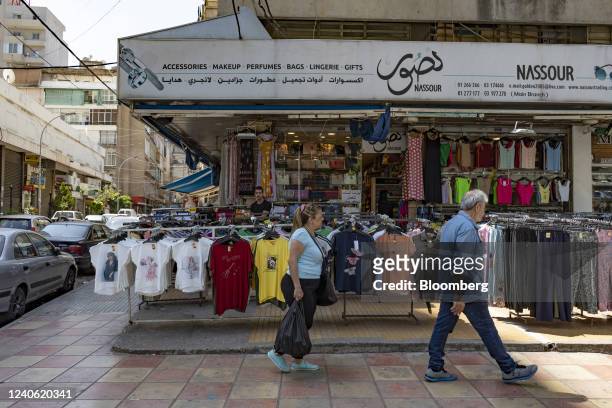 Shoppers pass a clothing store in the Burj Hammoud district of Beirut, Lebanon, on Wednesday, May 11, 2022. Top Lebanese officials conceded theyve...