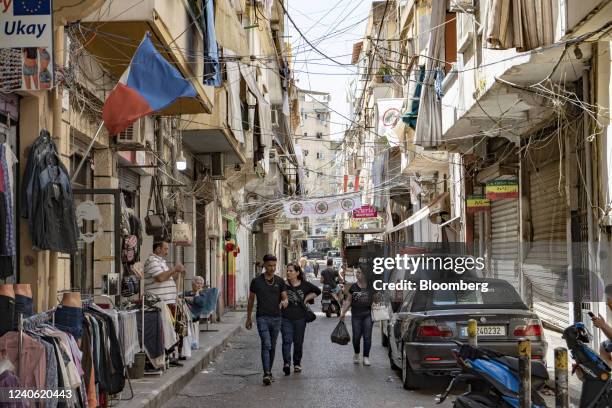 Banner for the Lebanese Forces party hangs above a street in Burj Hammoud district of Beirut, Lebanon, on Wednesday, May 11, 2022....