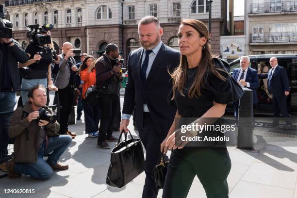 Coleen Rooney and the manager of EFL Championship club Derby County and former England footballer Wayne Rooney arrive at the Royal Courts of Justice...