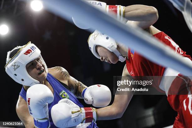 Brazilian athlete competes with Badmaarag Ganzorig of Mongolia during women's 54 kg match of the International Boxing Association Women's World...