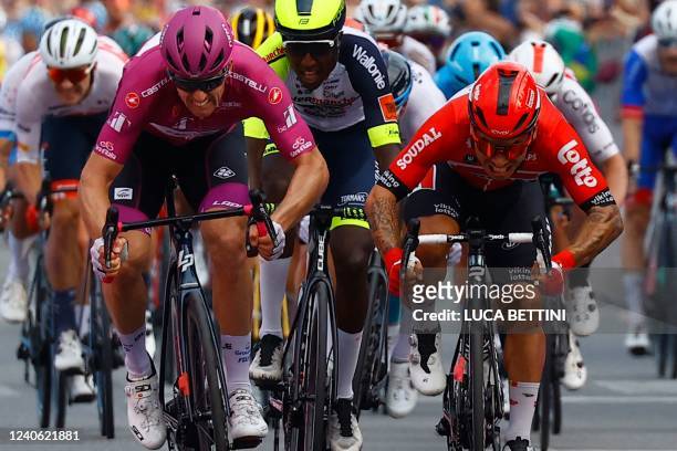 Team Groupama-FDJ's French rider Arnaud Demare and Team Lotto's Australian rider Caleb Ewan sprint in the last meters to respectively win and finish...