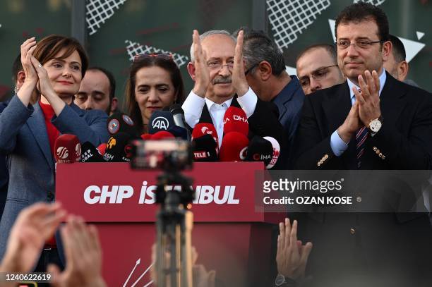 Republican People's Party leader Kemal Kilicdaroglu ?Canan Kaftancioglu , CHP Istanbul chairperson and Istanbul's mayor Ekrem Imamoglu applaud the...