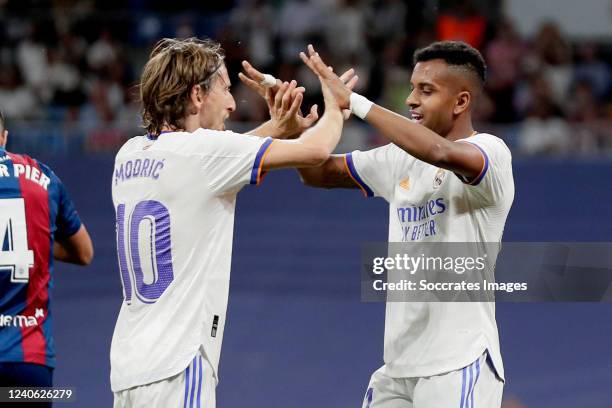 Rodrygo Silva de Goes of Real Madrid celebrates 3-0 with Luka Modric of Real Madrid during the La Liga Santander match between Real Madrid v Levante...