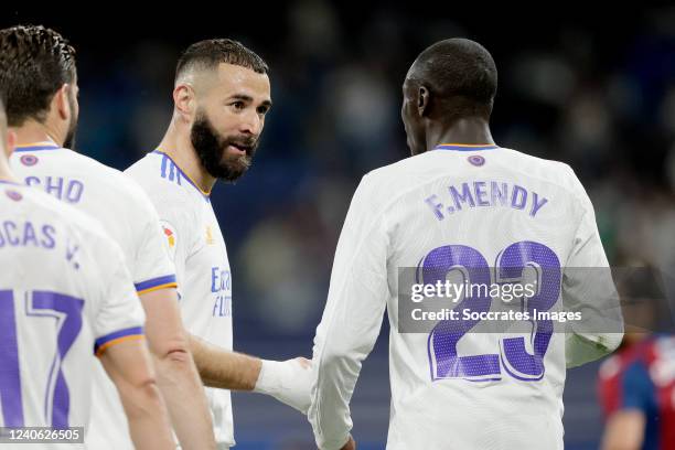 Karim Benzema of Real Madrid celebrates 2-0 with Ferland Mendy of Real Madrid during the La Liga Santander match between Real Madrid v Levante at the...