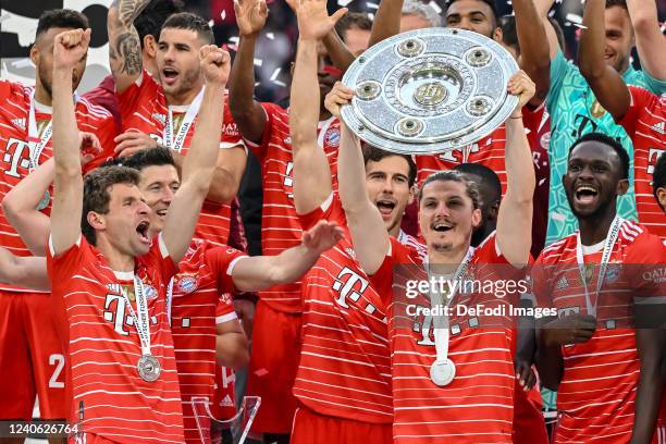 Marcel Sabitzer of Bayern Muenchen with championship trophy after the Bundesliga match between FC Bayern München and VfB Stuttgart at Allianz Arena...