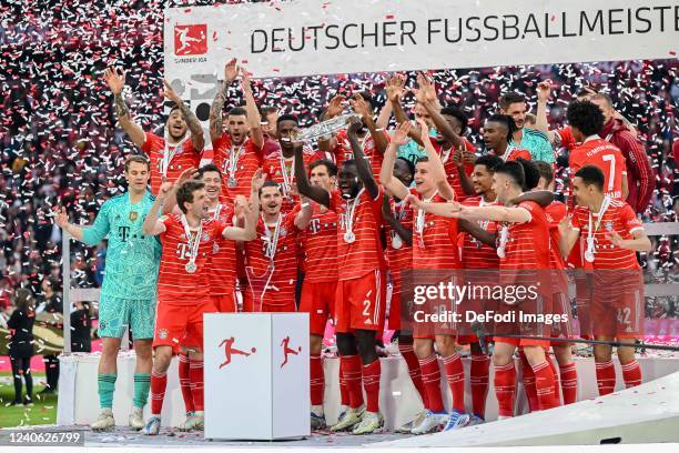 Dayot Upamecano of Bayern Muenchen with championship trophy after the Bundesliga match between FC Bayern München and VfB Stuttgart at Allianz Arena...