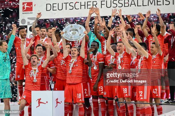 Marcel Sabitzer of Bayern Muenchen with championship trophy after the Bundesliga match between FC Bayern München and VfB Stuttgart at Allianz Arena...