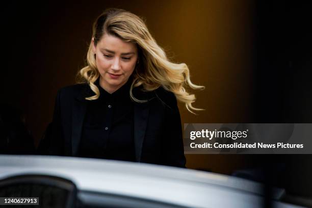 Amber Heard departs following the recess for the day outside court during the Johnny Depp and Amber Heard civil trial at Fairfax County Circuit Court...