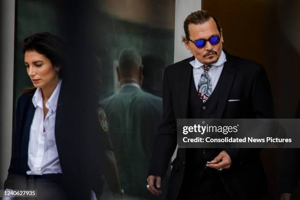 Johnny Depp departs following the recess for the day outside court during the Johnny Depp and Amber Heard civil trial at Fairfax County Circuit Court...