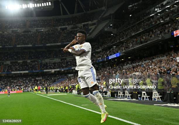 Real Madrid's Brazilian forward Vinicius Junior celebrates scoring his third goal, his team's sixth goal, during the Spanish league football match...