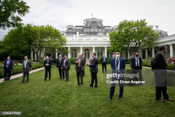 Security officials stand in the Rose Garden as President Joe Biden participates in the family photo for the U.S.-ASEAN Special Summit on May 12, 2022...
