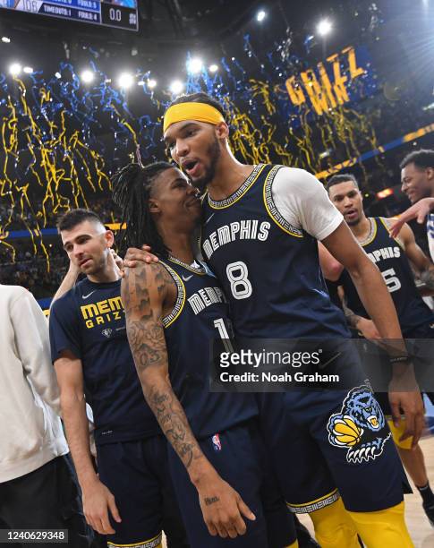 Ja Morant and Ziaire Williams of the Memphis Grizzlies celebrate after the game against the Golden State Warriors during Game 2 of the 2022 NBA...