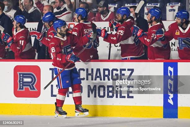 Laval Rocket left wing Danick Martel celebrates his goal with his teammates at the bench during the game 3 of round 2 of the Calder Cup Playoffs...