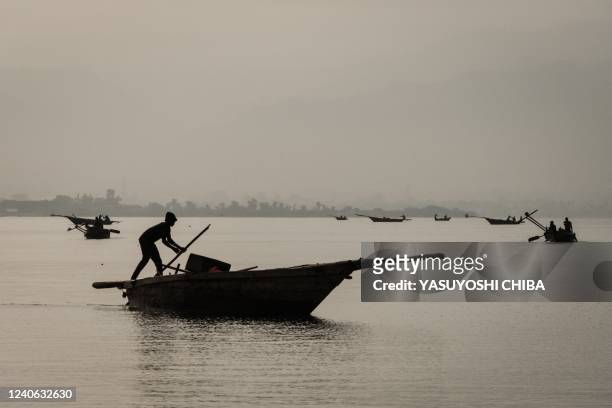 Fishermen leave for a fishing expidition at Lake Tanganyika in Bujumbura, Burundi, on March 16, 2022.