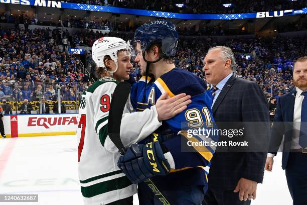 Kirill Kaprizov of the Minnesota Wild congratulates Vladimir Tarasenko of the St. Louis Blues after Game Six of the First Round of the 2022 Stanley...