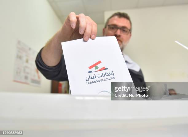 Public officials, who will take charge as pole clerks, cast their votes before the general elections to be held in 16 May Lebanon , Beirut on May 12,...
