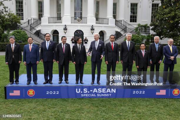 President Joe Biden, center, and leaders from the Association of Southeast Asian Nations, ASEAN, pose for a group photo on the South Lawn of the...