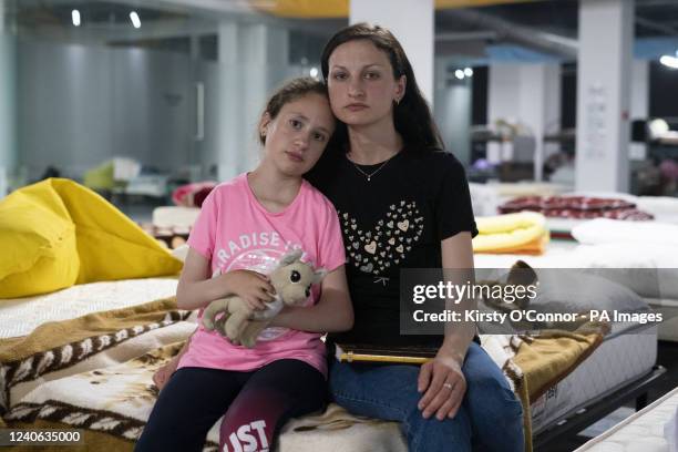 Ukrainian refugee Elena Boyko and her daughter Viktoria Boyko at the Egros refugee transit centre in Iasi, Romania. Picture date: Thursday May 12,...