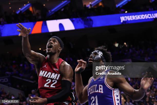 Joel Embiid of Philadelphia 76ers and Jimmy Butler of Miami Heat in action during NBA semifinals between Philadelphia 76ers and Miami Heat at the...