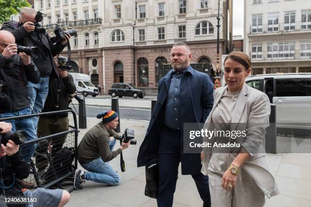 Former England footballer Wayne Rooney and his wife Coleen Rooney arrive at the Royal Courts of Justice on the fourth day of the high-profile trial...