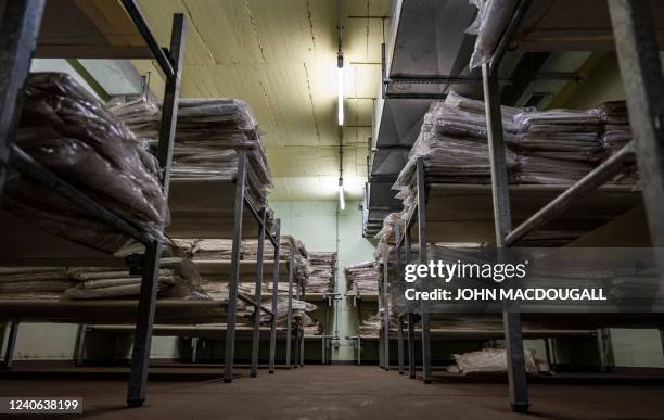 This picture shows an infirmary in the Pankstrasse nuclear fallout shelter in Berlin on May 10, 2022. - Built in 1977 during the Cold War, this...