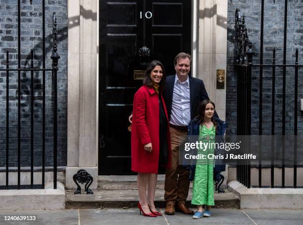 Nazanin Zaghari-Ratcliffe , her daughter Gabriella and her husband Richard Ratcliffe pose for a photograph as they arrive for a meeting at 10 Downing...