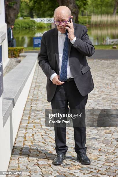 French Foreign Minister Jean-Yves Le Drian arrives for a meeting of foreign ministers of the G7 member states at the Schlossgut Weissenhaus venue on...