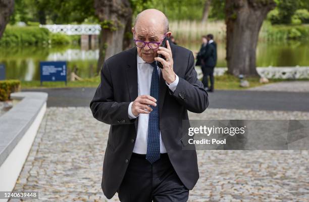 French Foreign Minister Jean-Yves Le Drian arrives for a meeting of foreign ministers of the G7 member states at the Schlossgut Weissenhaus venue on...