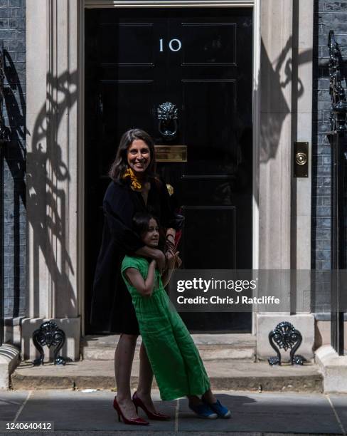 Nazanin Zaghari-Ratcliffe and her daughter Gabriella stand on the doorstep after a meeting at 10 Downing Street on May 13, 2022 in London, England....