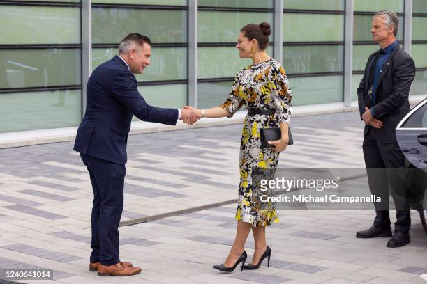 Crown Princess Victoria of Sweden attends the inauguration of the new Angstrom laboratory at Uppsala University and is greeted by Johan Tysk on May...