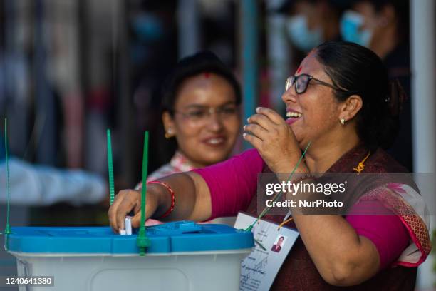 Nepalese woman casts her vote during countrys 2022 local election at Bhaktapur, Nepal on Friday, May 13, 2022.