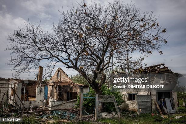 Photograph shows destroyed houses in the village of Vilkhivka, near the eastern city of Kharkiv on May 13 on the 79th day of the Russian invasion of...