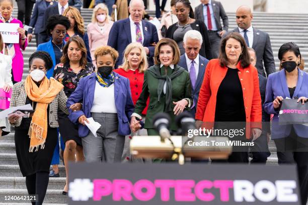First row from left, Reps. Sheila Jackson Lee, D-Texas, Barbara Lee, D-Calif., Speaker of the House Nancy Pelosi, D-Calif., Diana DeGette, D-Colo.,...