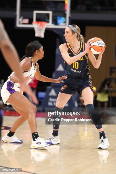 Lexie Hull of the Indiana Fever handles the ball during the game against the Los Angeles Sparks at Gainbridge Fieldhouse on May 8, 2022 in...