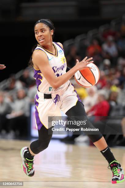 Jordin Canada of the Los Angeles Sparks handles the ball during the game against the Indiana Fever at Gainbridge Fieldhouse on May 8, 2022 in...