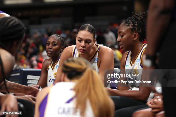 Liz Cambage and Nneka Ogwumike of the Los Angeles Sparks look on during the game against the Indiana Fever at Gainbridge Fieldhouse on May 8, 2022 in...