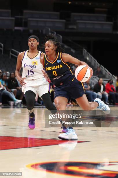 Kelsey Mitchell of the Indiana Fever drives to the basket during the game against the Los Angeles Sparks at Gainbridge Fieldhouse on May 8, 2022 in...