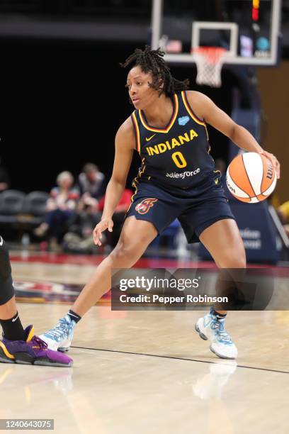 Kelsey Mitchell of the Indiana Fever handles the ball during the game against the Los Angeles Sparks at Gainbridge Fieldhouse on May 8, 2022 in...