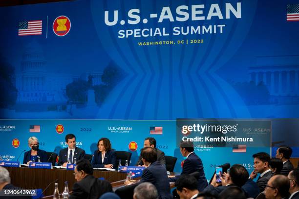 Vice President Kamala Harris, flanked by Secretary of Transportation Pete Buttigieg and Deputy National Security Advisor to the Vice President Philip...