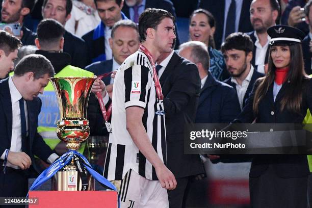 Dusan Vlahovic of FC Juventus looks dejected near the Coppa Italia trophy during the Coppa Italian Final match between Juventus FC and FC...