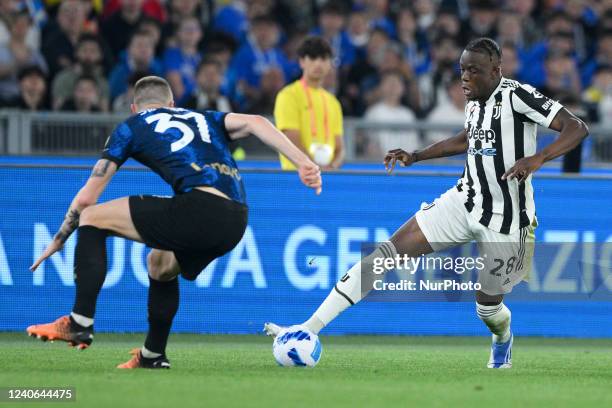 Denis Zakaria of FC Juventus and Milan Skriniar of FC Internazionale competes for the ball during the Coppa Italian Final match between Juventus FC...