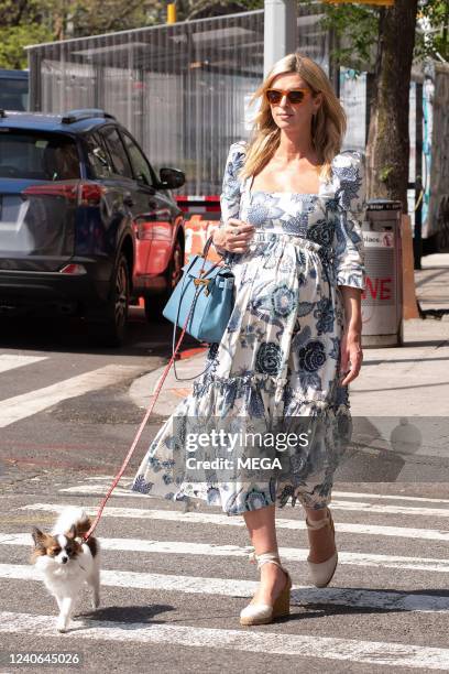 Nicky Hilton takes her dog for a walk on May 12, 2022 in New York City.