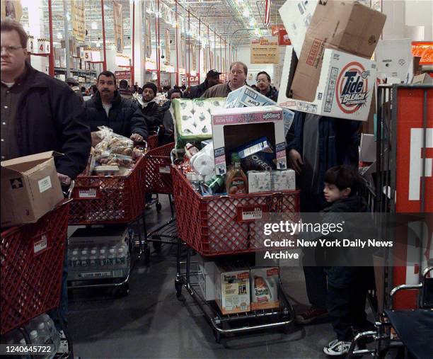 December 23: Buyers at various Queens stores were shopping because of the Y2K scare. Most say they weren't worried but not taking chances. These...