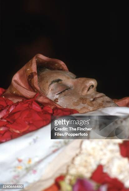 The body of Indira Gandhi seen lying in state at Teen Murti House following her death a few days earlier, in New Delhi, India on 1st November, 1984....
