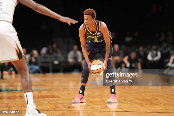 Danielle Robinson of the Indiana Fever handles the ball against the New York Liberty on May 13, 2022 at Barclays Center in Brooklyn, New York. NOTE...