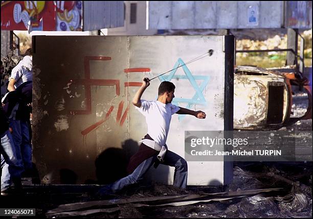 Demonstration of Tanzim and violent clashes between Tanzim, Palestinians and the Israeli army after the death of a young Palestinian In Ramallah,...