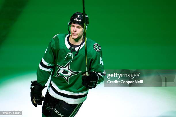 Miro Heiskanen of the Dallas Stars celebrates after defeating the Calgary Flames in Game Six of the First Round of the 2022 Stanley Cup Playoffs at...