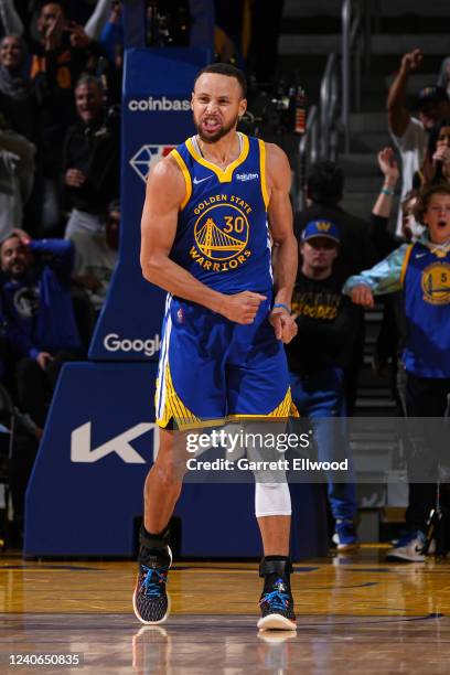 Stephen Curry of the Golden State Warriors celebrates against the Memphis Grizzlies during Game 6 of the 2022 NBA Playoffs Western Conference...